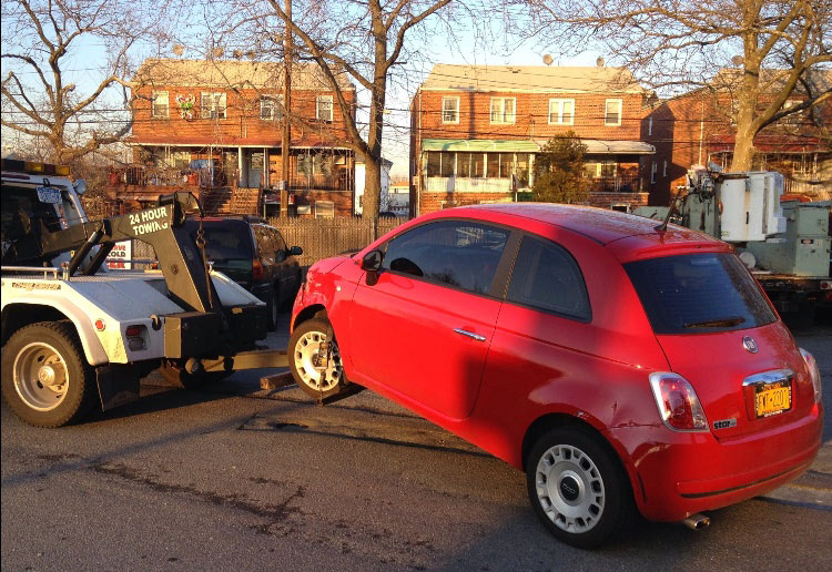 A car using towing services in Manhattan, NY